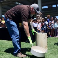 Time Gomes, who originally built the time capsule, was on hand to open it on Friday in Heritage Park.